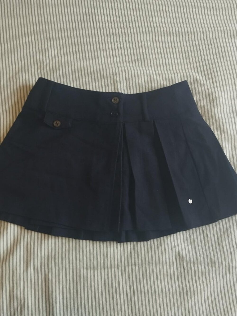 pleated navy blue mini skirt
